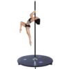 dancing on a black powder coated x stage lite portable freestanding dance pole with platform base
