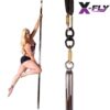 A woman on a X Pole Flying Pole