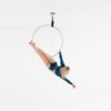 a woman exercising on her lyra hoop