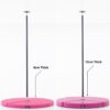 2 pink pole mats on 2 dance poles