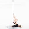 a pole fitness dancer on a silver pole mat around your lupit pole